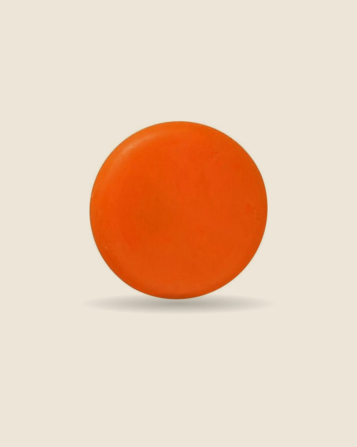 Round orange persimmon and goat milk soap bar